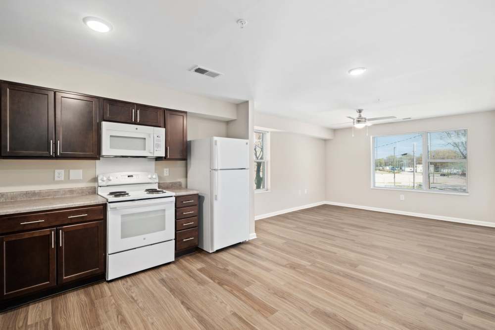 Spacious kitchen with wood-style flooring at Five Points Crossing in Rocky Mount, North Carolina