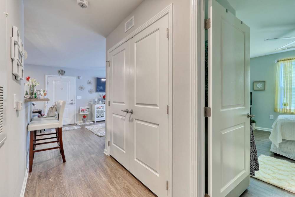 Welcoming entryway with wood-style flooring at Harbor Meadows in Calabash, North Carolina
