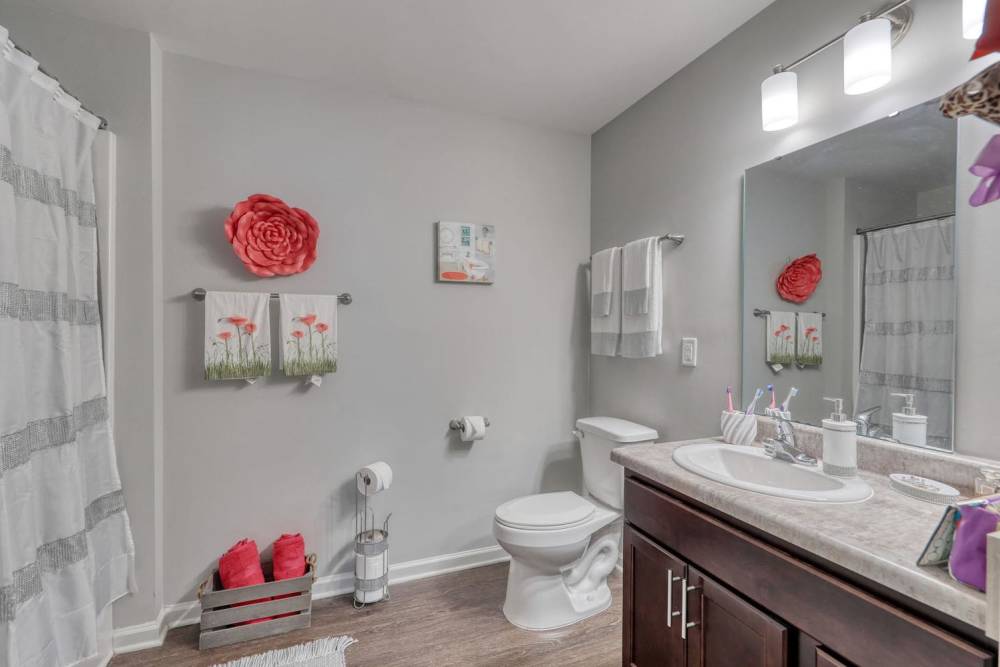 Modern bathroom with floral decor at Harbor Meadows in Calabash, North Carolina