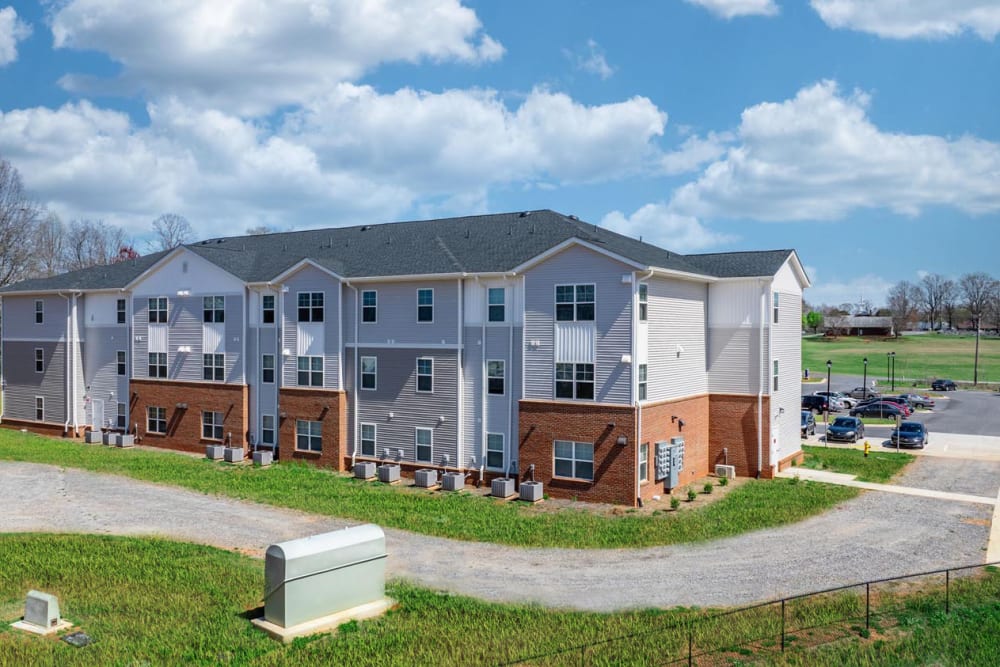 Modern apartment building with green space at Landon Greene in Statesville, North Carolina