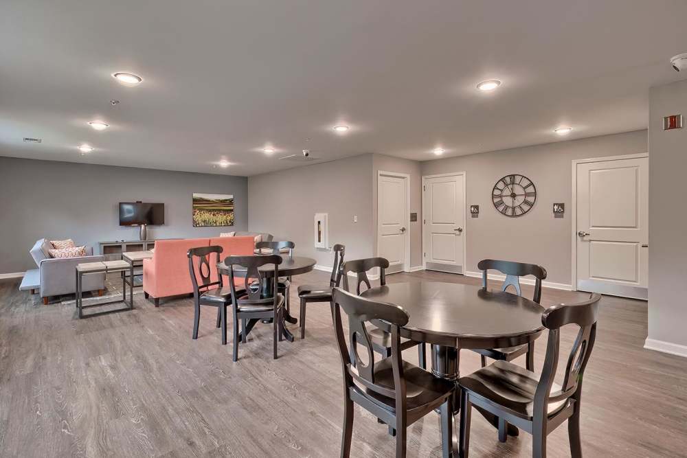 Community lounge with seating and TV at Lowcountry Crossing in Denmark, South Carolina