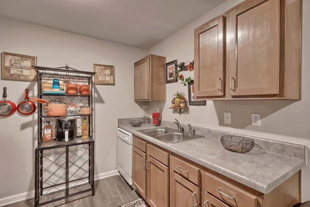 Modern kitchen with granite countertops and stainless steel appliances at Lowcountry Crossing in Denmark, South Carolina