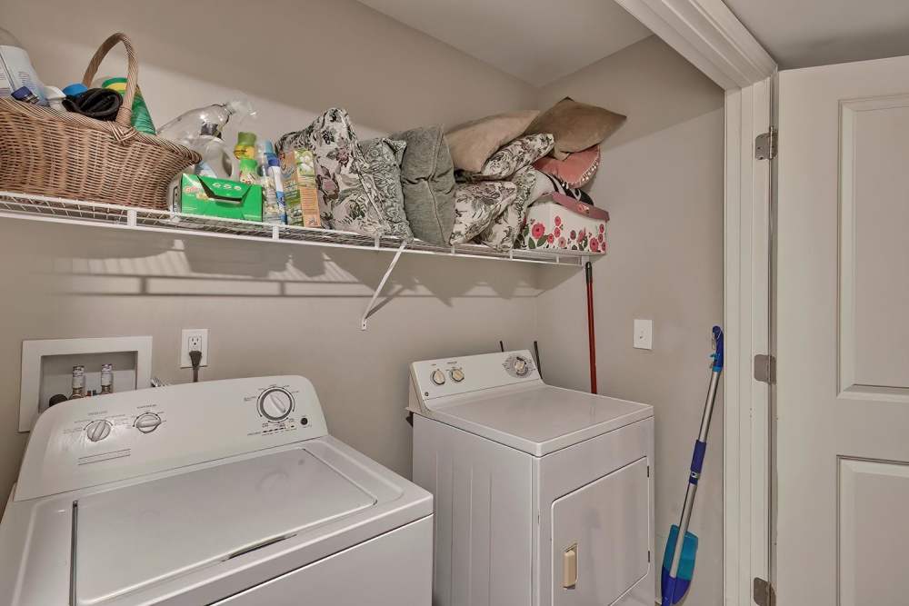Laundry room with washer and dryer at Lowcountry Crossing in Denmark, South Carolina