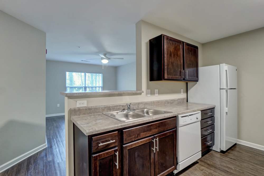 Kitchen with granite countertops at Tate Commons in New Bern, North Carolina