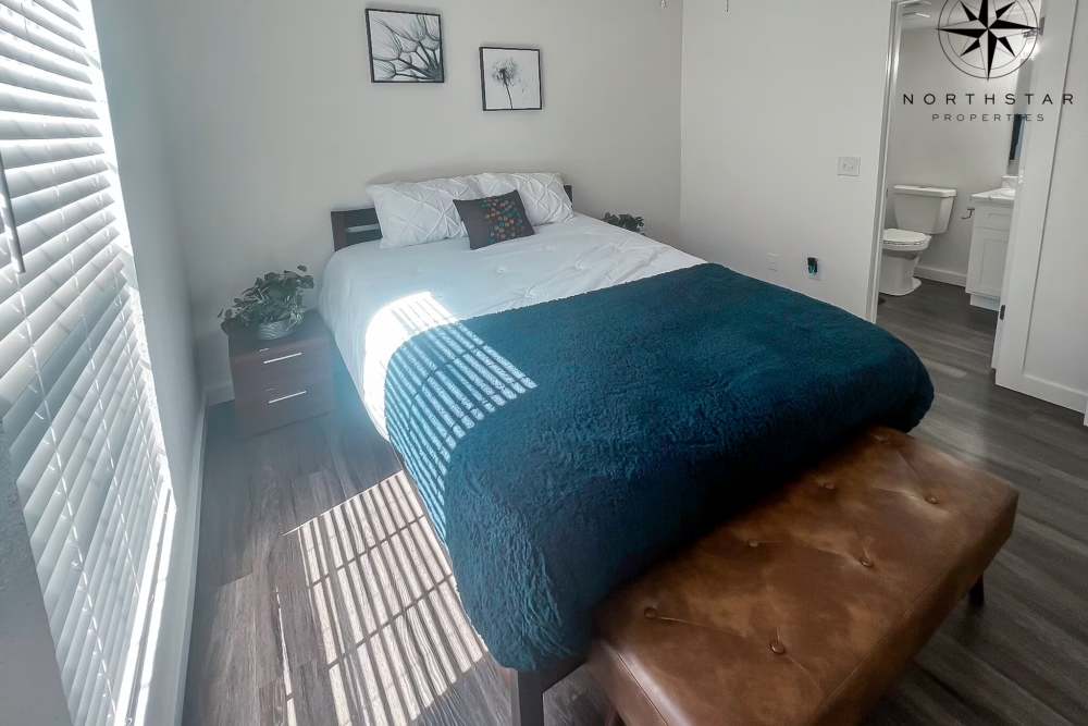 Well-lit bedroom at Quail Ridge in Oklahoma City,Oklahoma