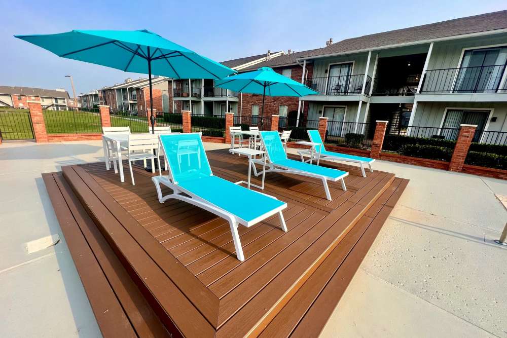 Lounge chairs near the swimming pool at Quail Ridge in Oklahoma City,Oklahoma