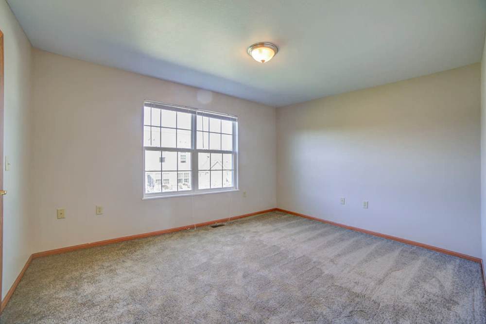 Unfurnished bedroom with large window at Raystown Crossing in Shippensburg, Pennsylvania