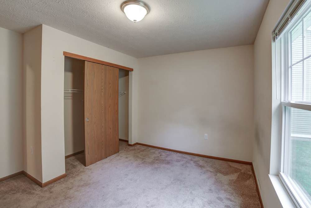 Bedroom with closet at Quaker Meadows in Hermitage, Pennsylvania