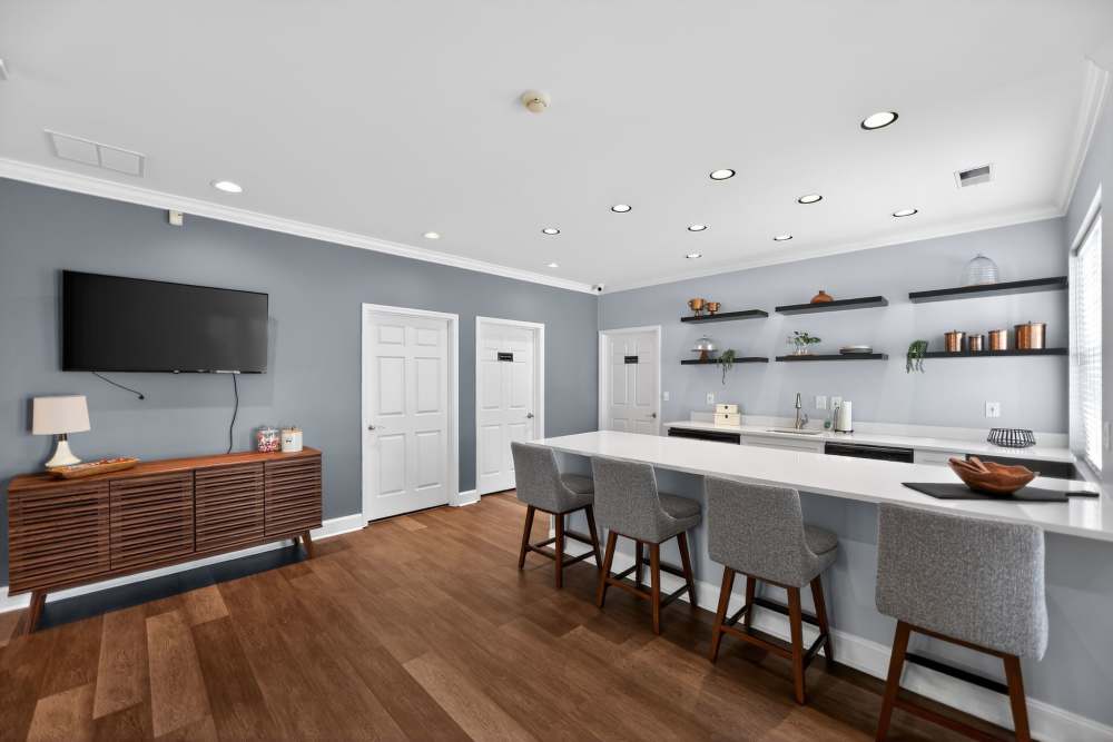 Clubhouse with wooden flooring at Mansions at Delmar, an Eagle Rock Community in Delmar, New York