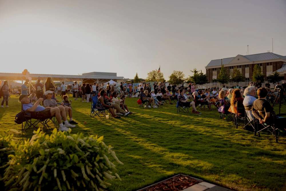 Residents enjoying a party in the lawn at Villas at Stonebridge in Owasso, Oklahoma
