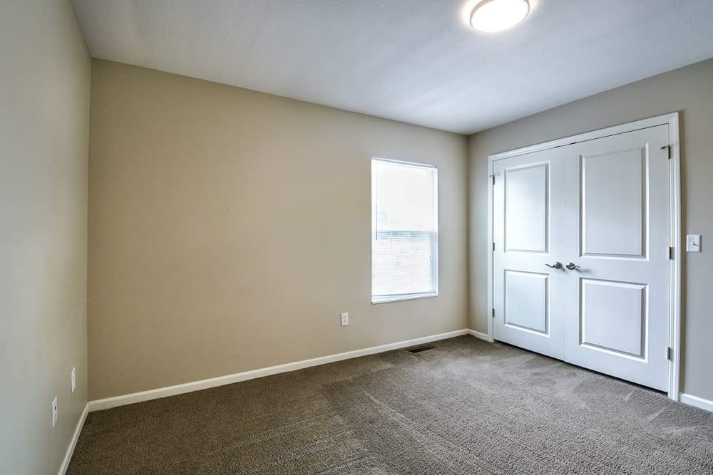 Townhome bedroom with ceiling lights at Woodyard Greene in Elizabeth, West Virginia