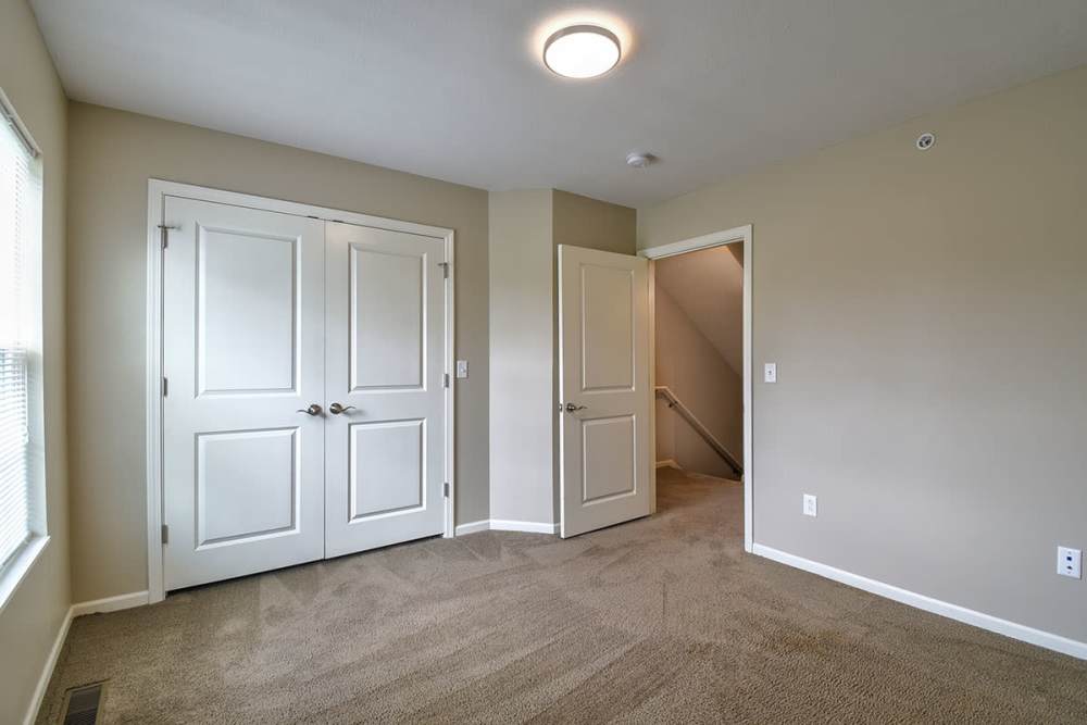 Ceiling lights and spacious closets of bedroom at Woodyard Greene in Elizabeth, West Virginia