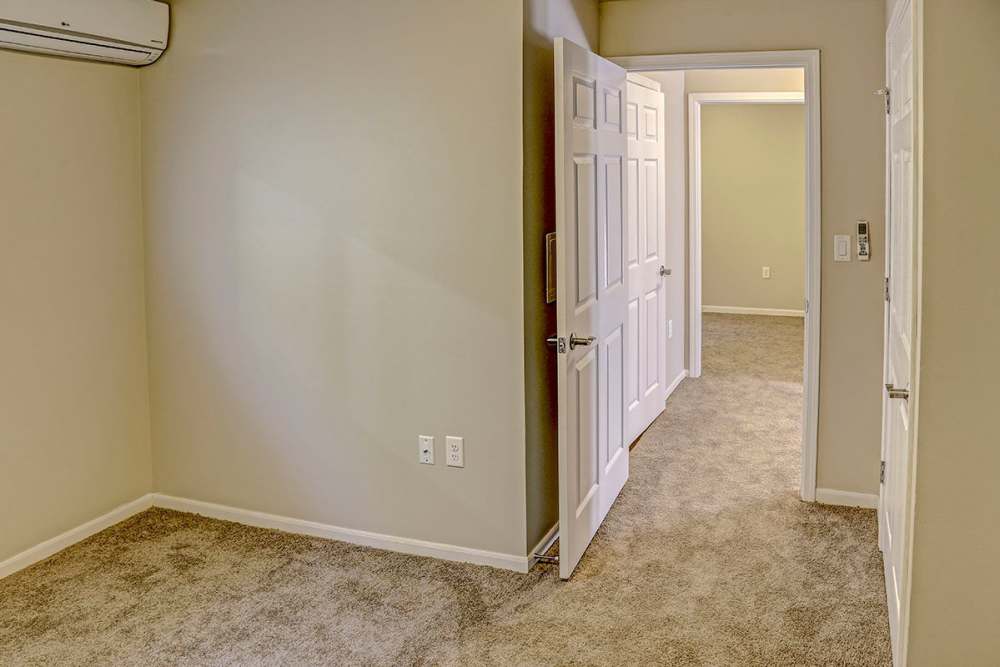 Bedroom with carpet flooring at Alston Park in Cincinnati. OH