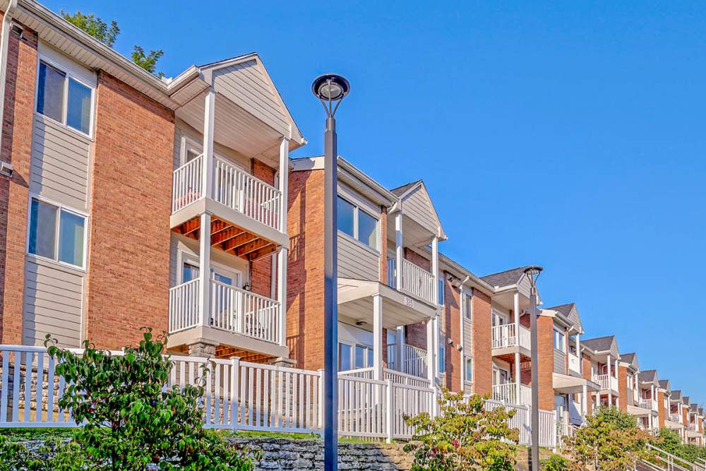 Row of apartment balconies with white railings at Alston Park in Cincinnati, Ohio