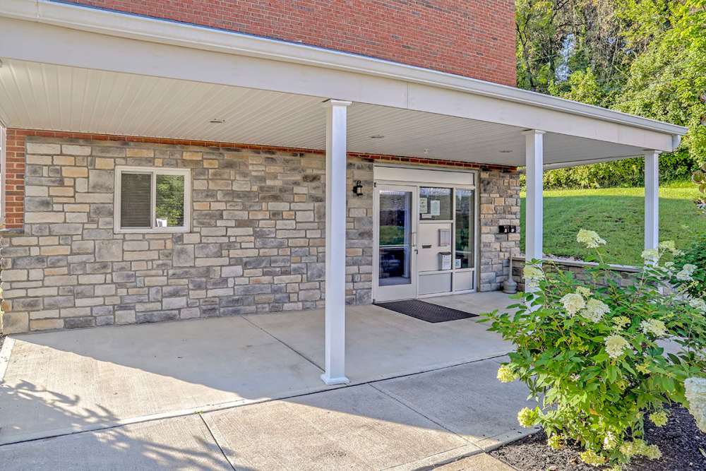 Gated entrance with stone and brick exterior at Alston Park in Cincinnati, Ohio