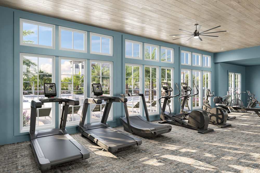 Fitness center with cardio equipment at Romero Apartments in Pensacola, Florida