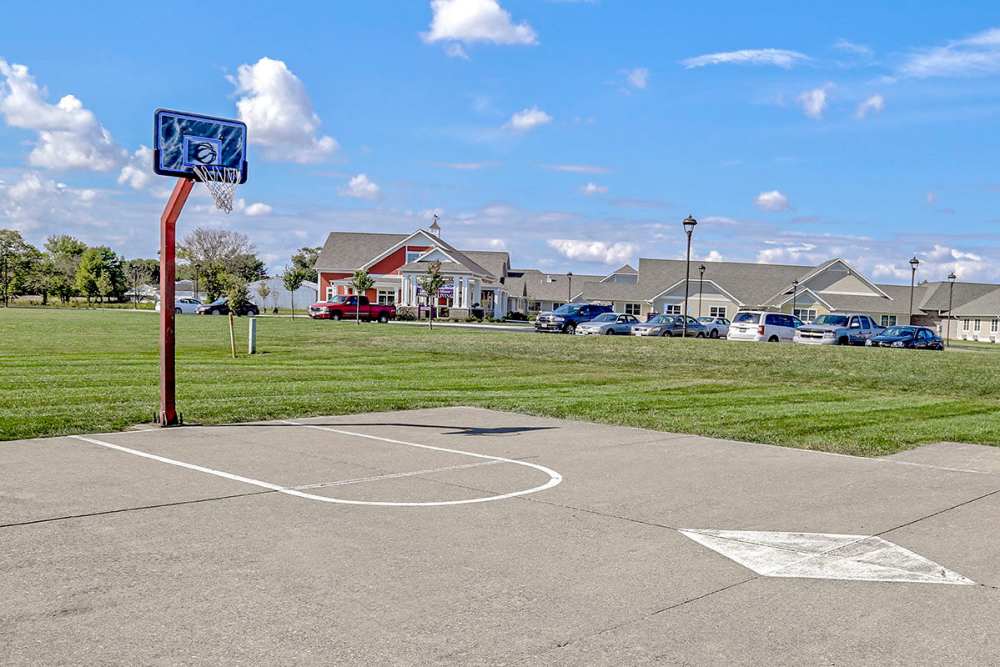 Basketball court with community buildings nearby near Glennview Apartments in Washington Court House, Ohio