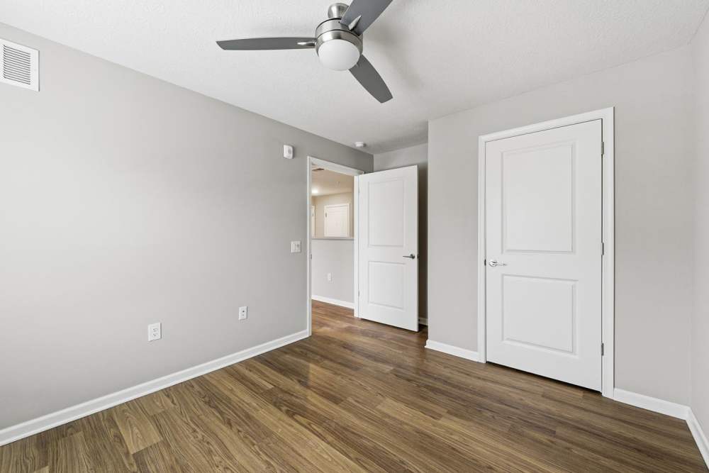 Spacious room with ceiling fan and featuring open layout at Granville Woods Lofts in Columbus, Ohio