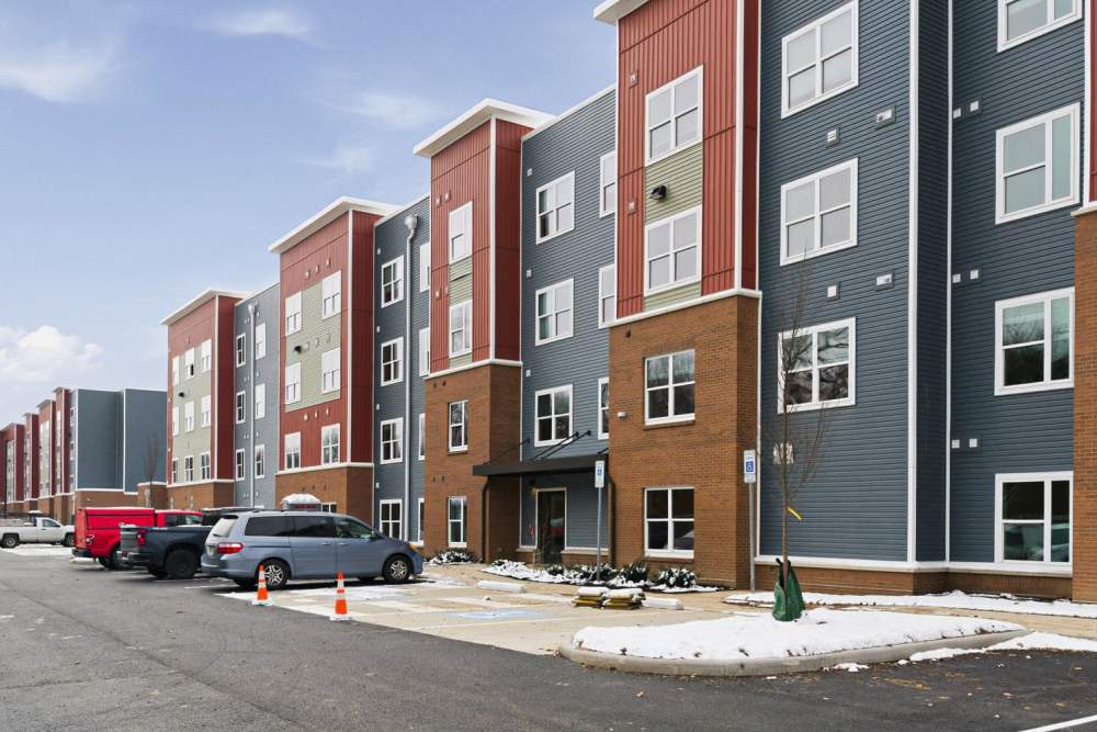 Modern apartment community with car parking at Granville Woods Lofts in Columbus, Ohio