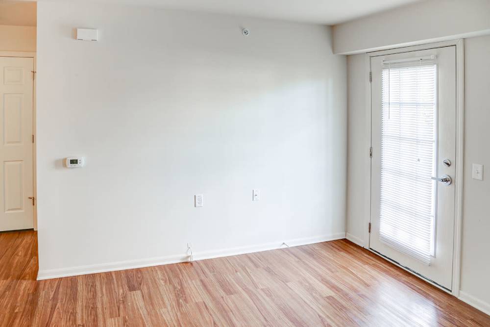 Bright living area with access to a private patio at Hayden House in Springfield, Ohio