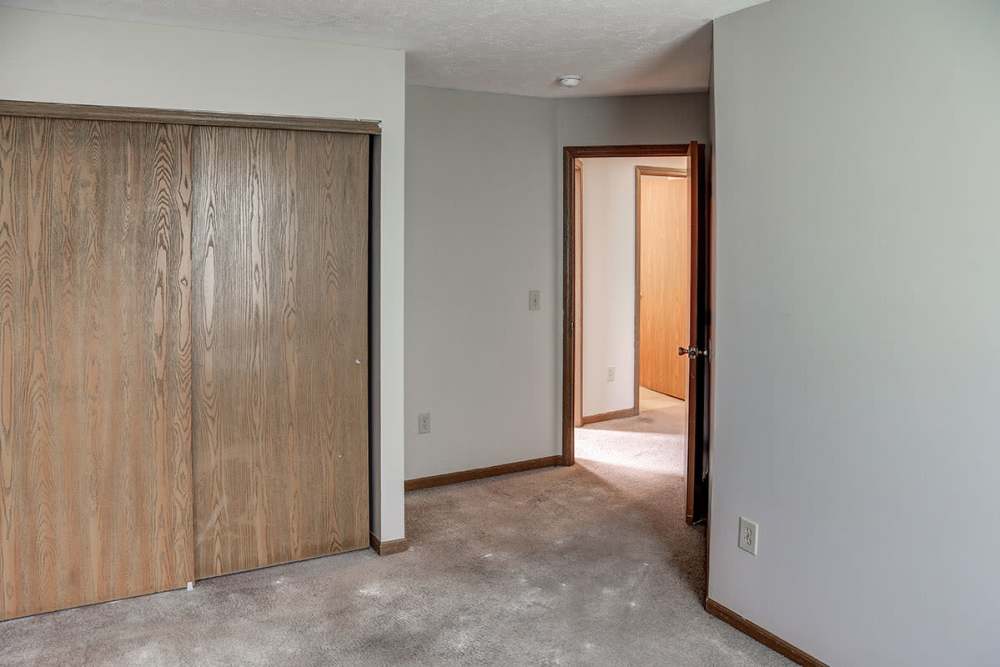 Bedroom with a closet area at Ivy Glen in Washington Court House, Ohio 