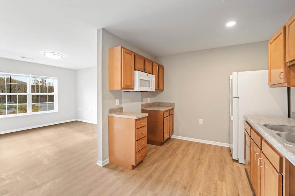 Open layout kitchen with granite countertops at Kershaw Greene II in Athens, Ohio