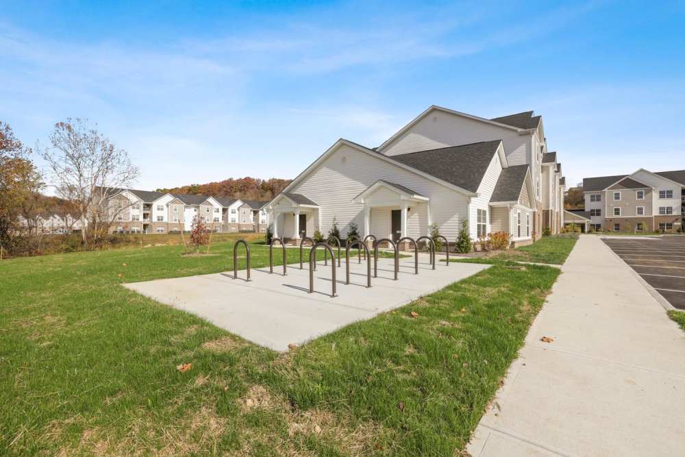 Bicycle racks in front of modern apartment buildings at Kershaw Greene II in Athens, Ohio