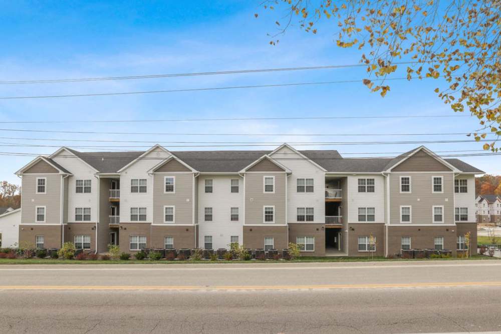 Modern apartment community with landscaped outdoor areas at Kershaw Greene II in Athens, Ohio