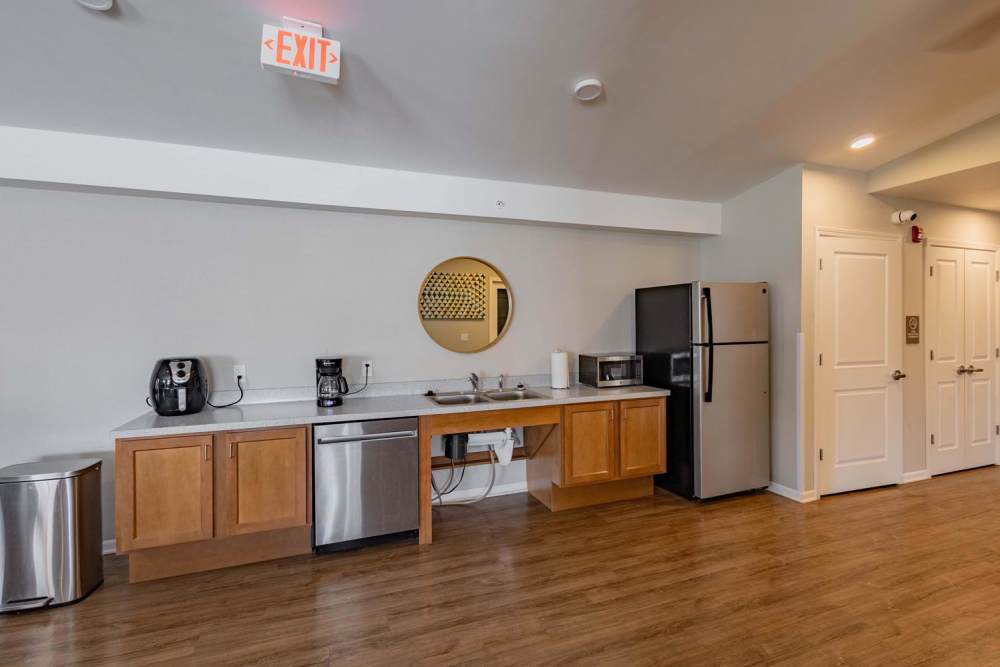 Modern kitchen with stainless steel appliances at Kershaw Greene II in Athens, Ohio