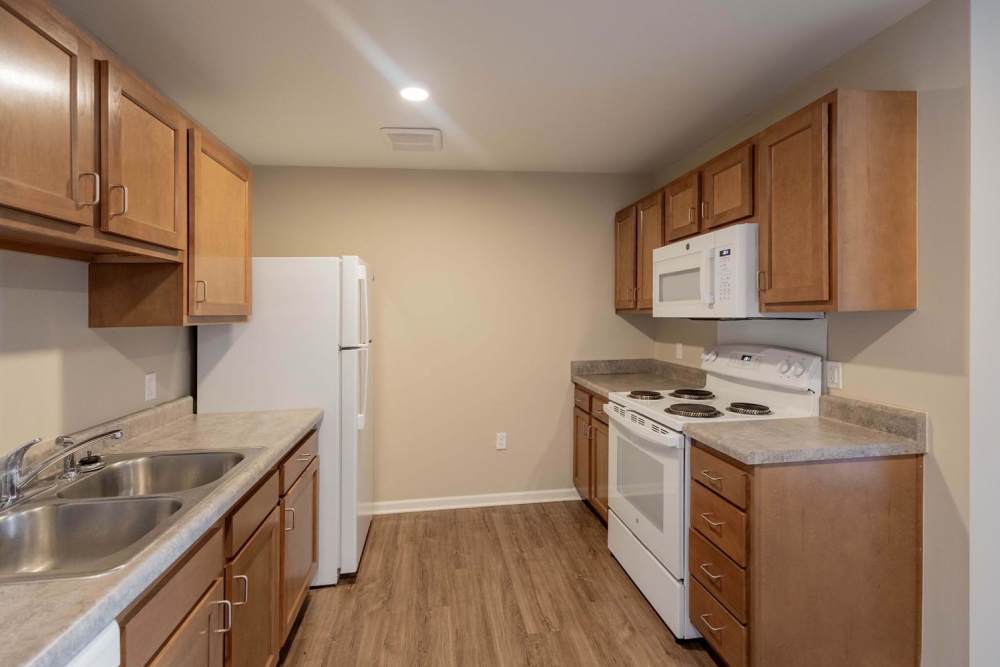 Modern kitchen with stainless steel appliances at Kershaw Greene II in Athens, Ohio