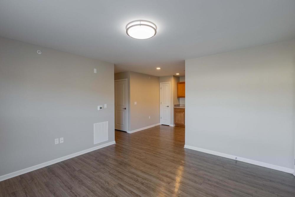 Spacious open layout with modern kitchen access at Kershaw Greene II in Athens, Ohio