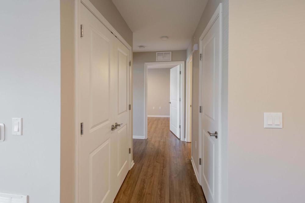 Hallway with wood-style flooring at Kershaw Greene II in Athens, Ohio