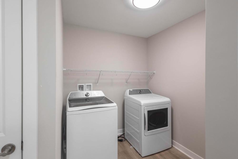 Laundry room with white washer and dryer at Sells Greene in Lancaster, Ohio