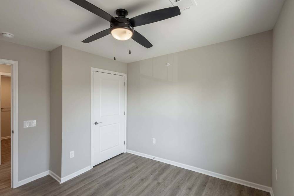 Spacious bedroom with neutral walls and closet access at Starling Yard in Columbus, Ohio