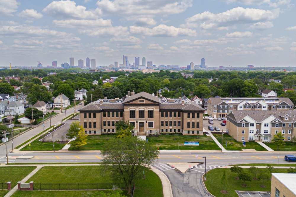 Building with modern apartments and green lawns at Starling Yard in Columbus, Ohio