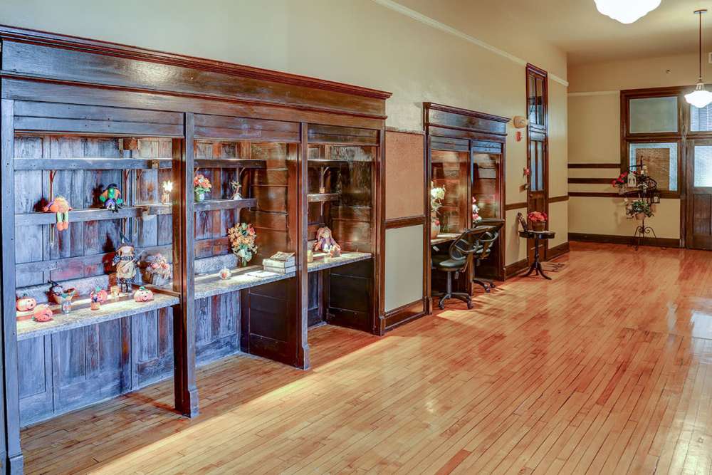 Community gathering space with wood flooring at Washington School Apartments in Washington Court House, Ohio