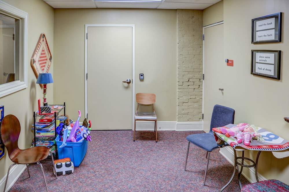 Playroom with toys and seating at Washington School Apartments in Washington Court House, Ohio