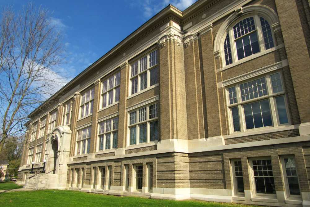 Historic brick building with large windows near Washington School Apartments in Washington Court House, Ohio