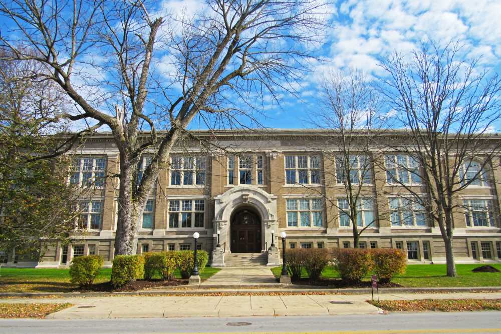 Historic building with landscaped entrance near Washington School Apartments in Washington Court House, Ohio