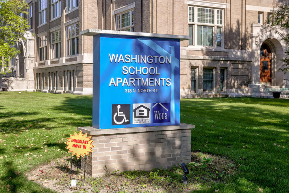 Apartment community sign at Washington School Apartments in Washington Court House, Ohio