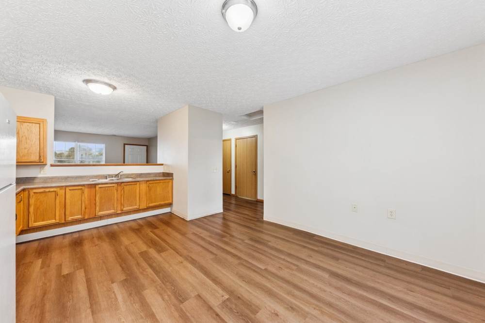 Open layout kitchen with bright natural light from windows at Webster Glen in Peebles, Ohio