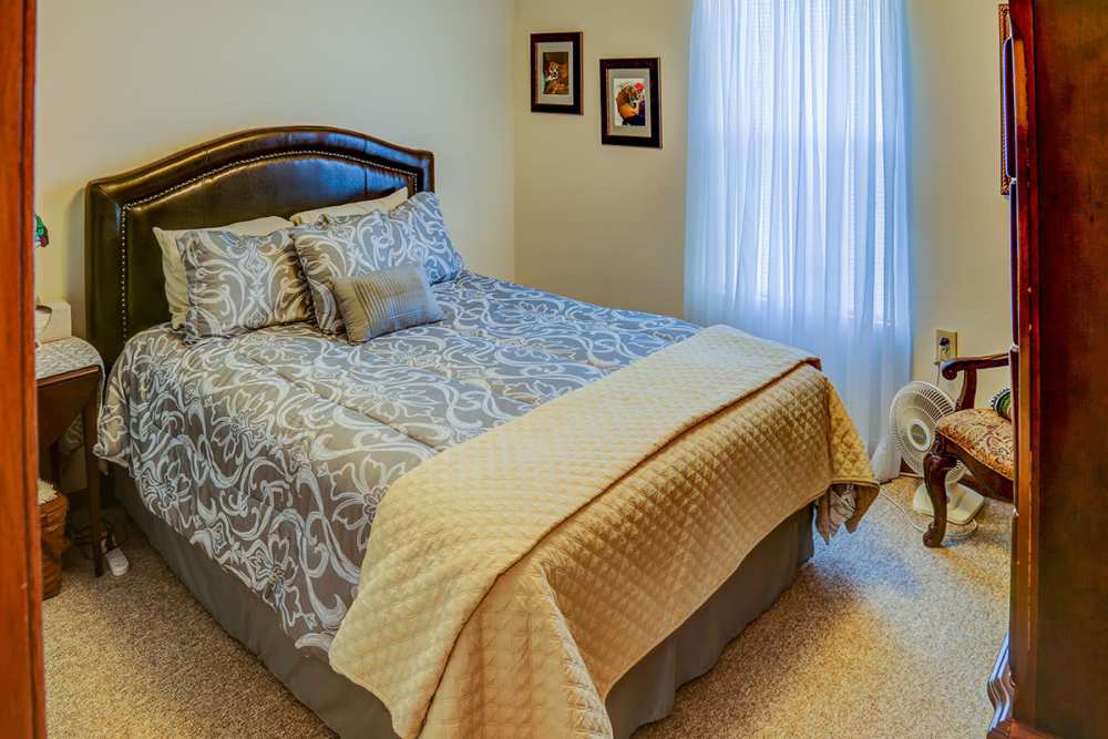 Bedroom with a comfortable bed and a window at Zacharys Crossing in Washington Court House, Ohio 