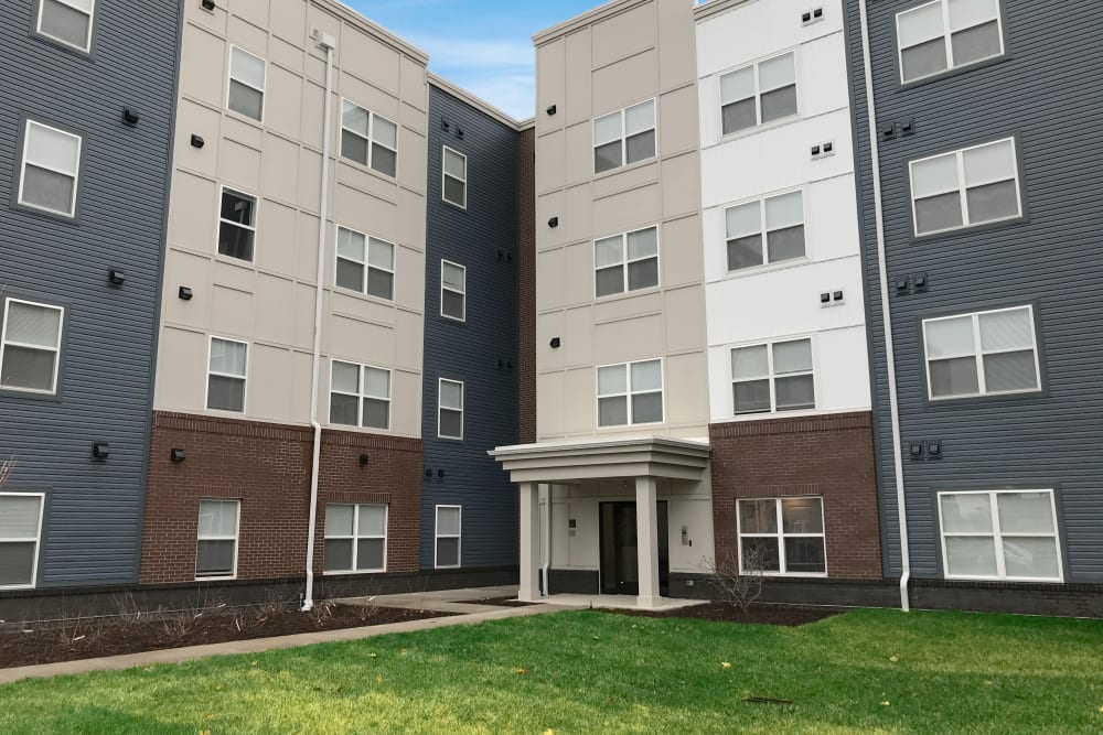 Property exterior with a lawn in the front at Atcheson Place Lofts in Columbus,Ohio