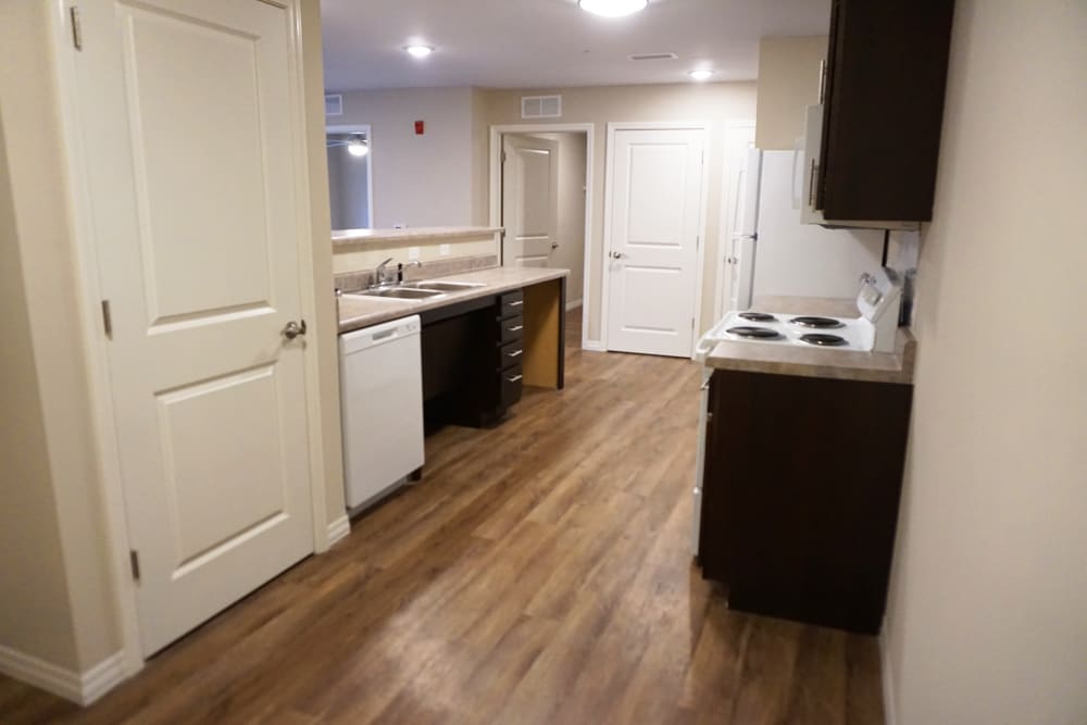 Granite countertops and wood-style flooring at Atcheson Place Lofts in Columbus, Ohio