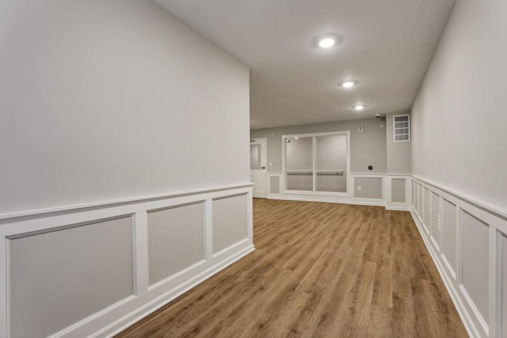 Wooden flooring with white wainscoting at McKinley Manor in Columbus, Ohio