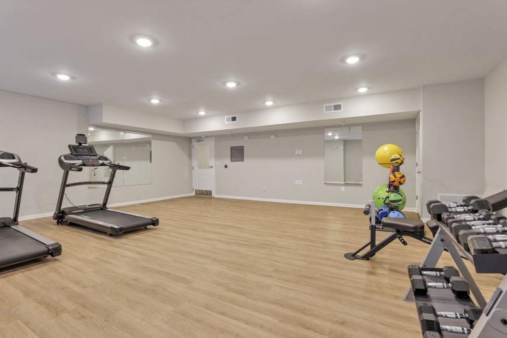 Treadmills and weights in a fitness room at McKinley Manor in Columbus, Ohio