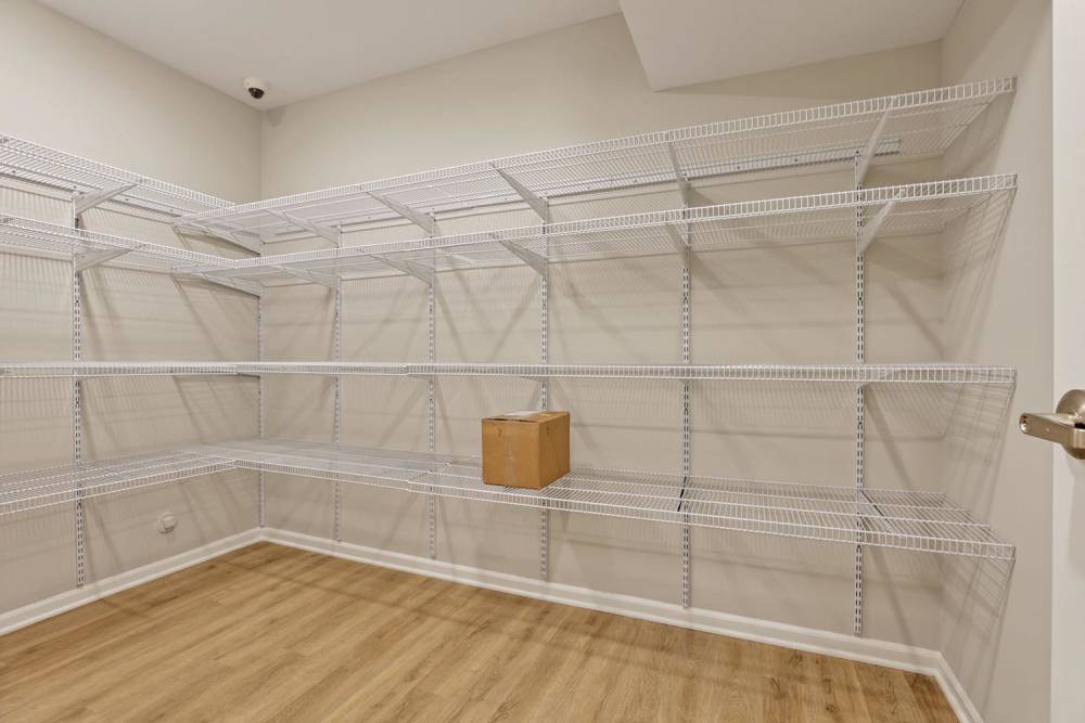 White wire shelving with a cardboard box at McKinley Manor in Columbus, Ohio