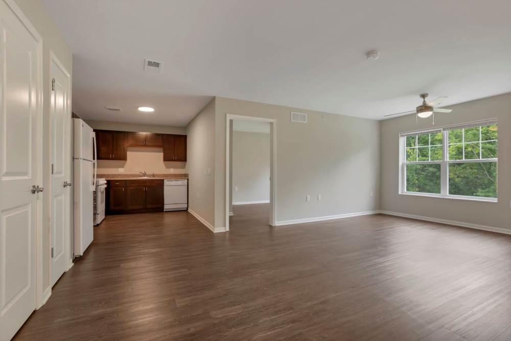 Spacious living room with kitchen at Wendler Commons in Columbus, Ohio