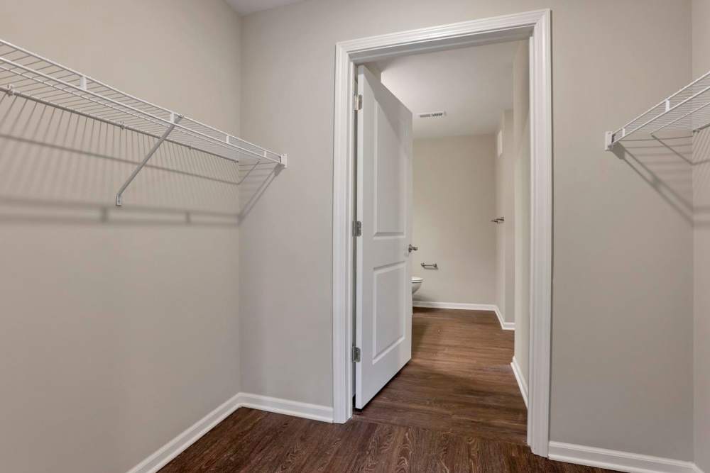 Walk-in closet with wood-style flooring at Wendler Commons in Columbus, Ohio