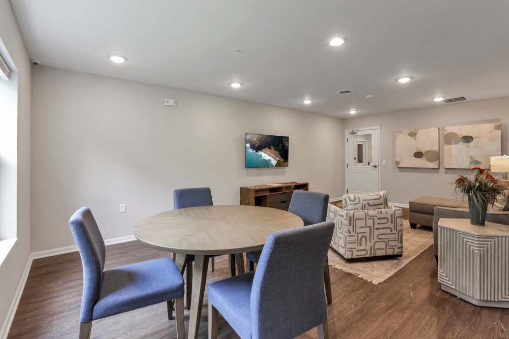 Open layout with bright lighting at dining area inside the clubhouse at Wendler Commons in Columbus, Ohio